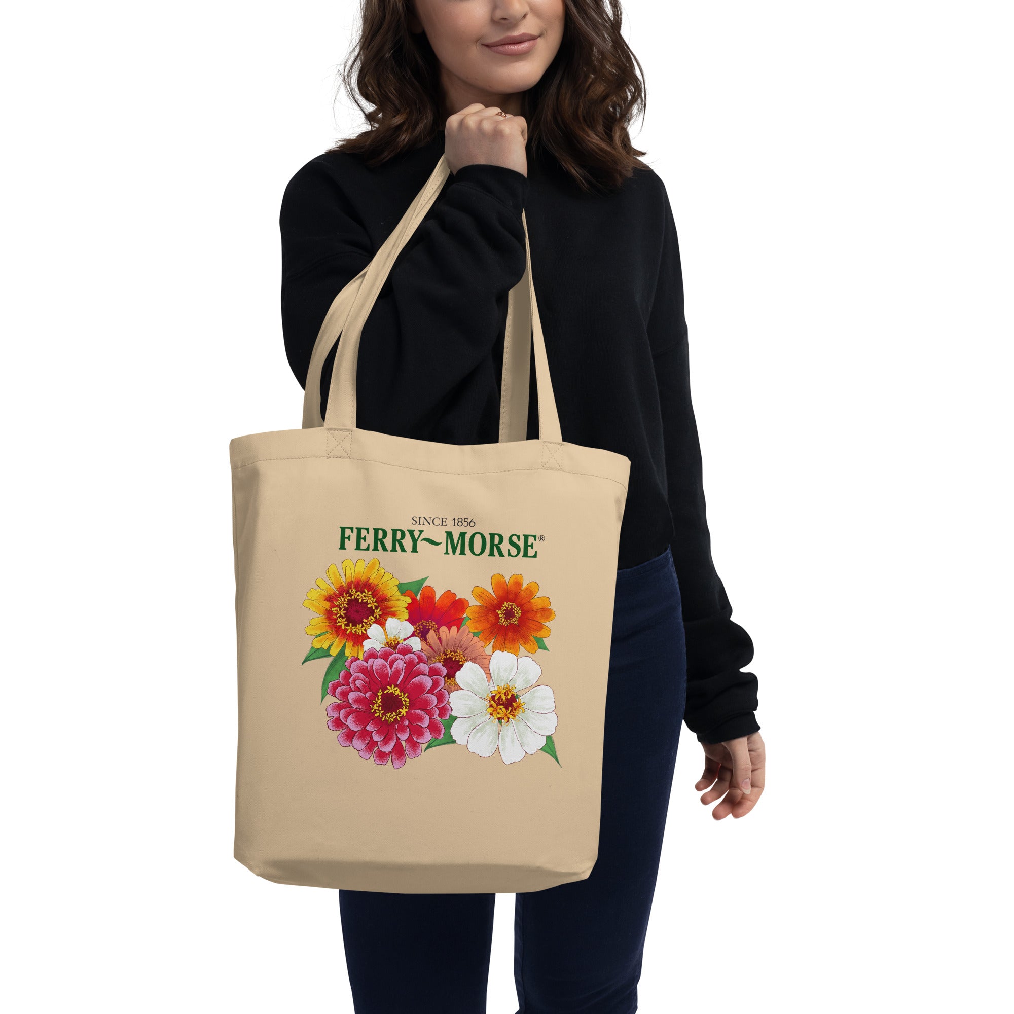 A beige bag with colorful zinnias printed on the front